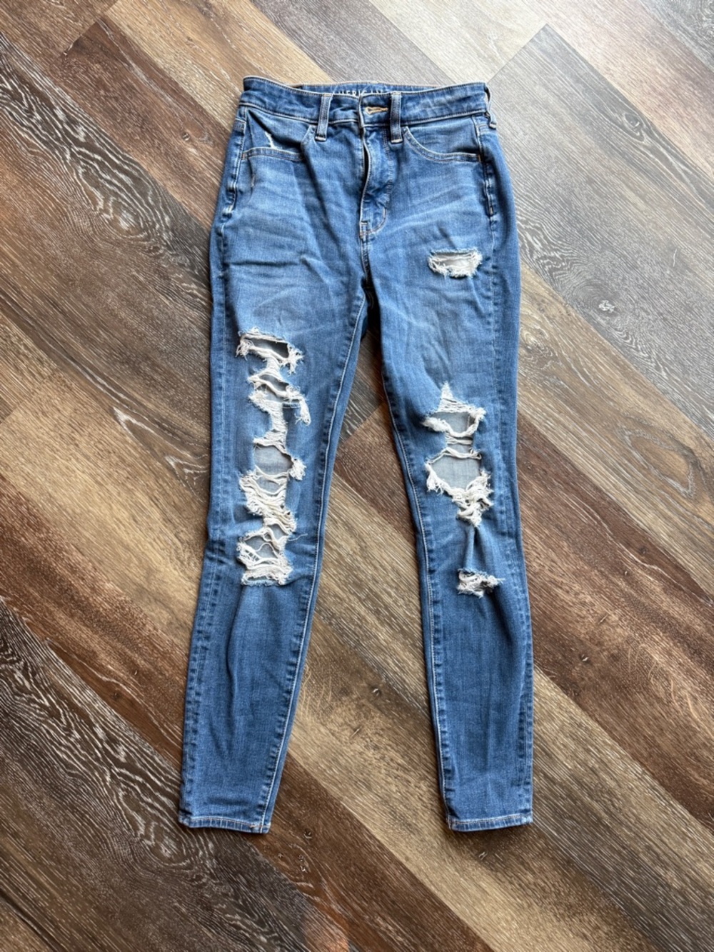 American Eagle Outfitters Distressed Super hi-rise jegging size 0